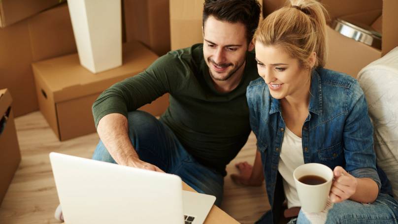couple looking at laptop